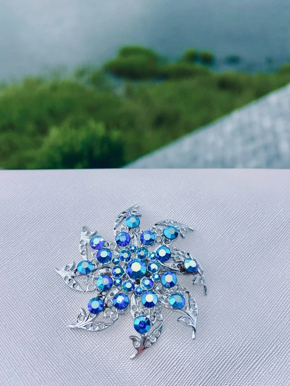 Stunning Silver Floral Brooch with Blue Crystal Accents - Women Jewelry